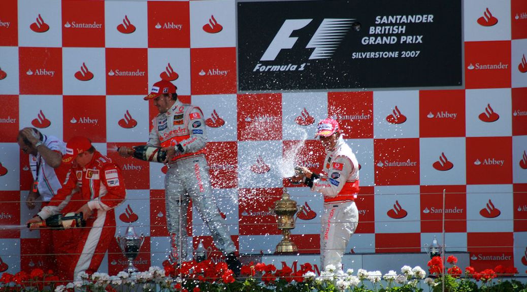 Hamilton and Alonso on the British Grand Prix podium in 2007 - copyright AKinsey Foto